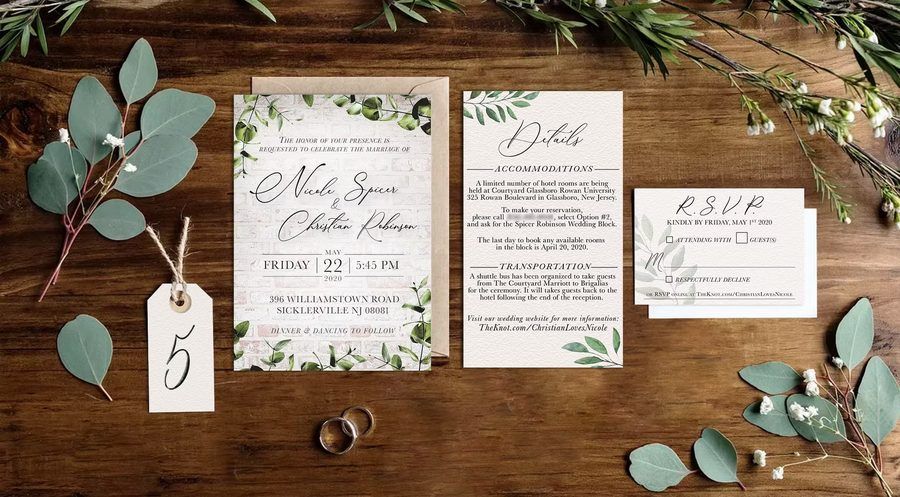 Greenery wedding invitation suite flat lay