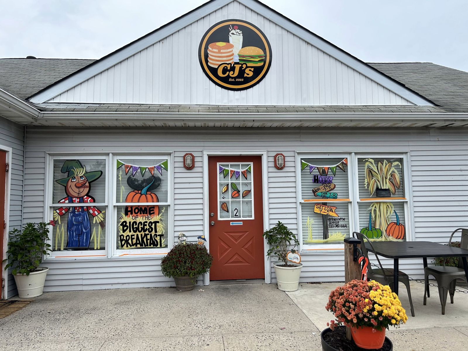 CJ's Diner storefront with badge logo signage