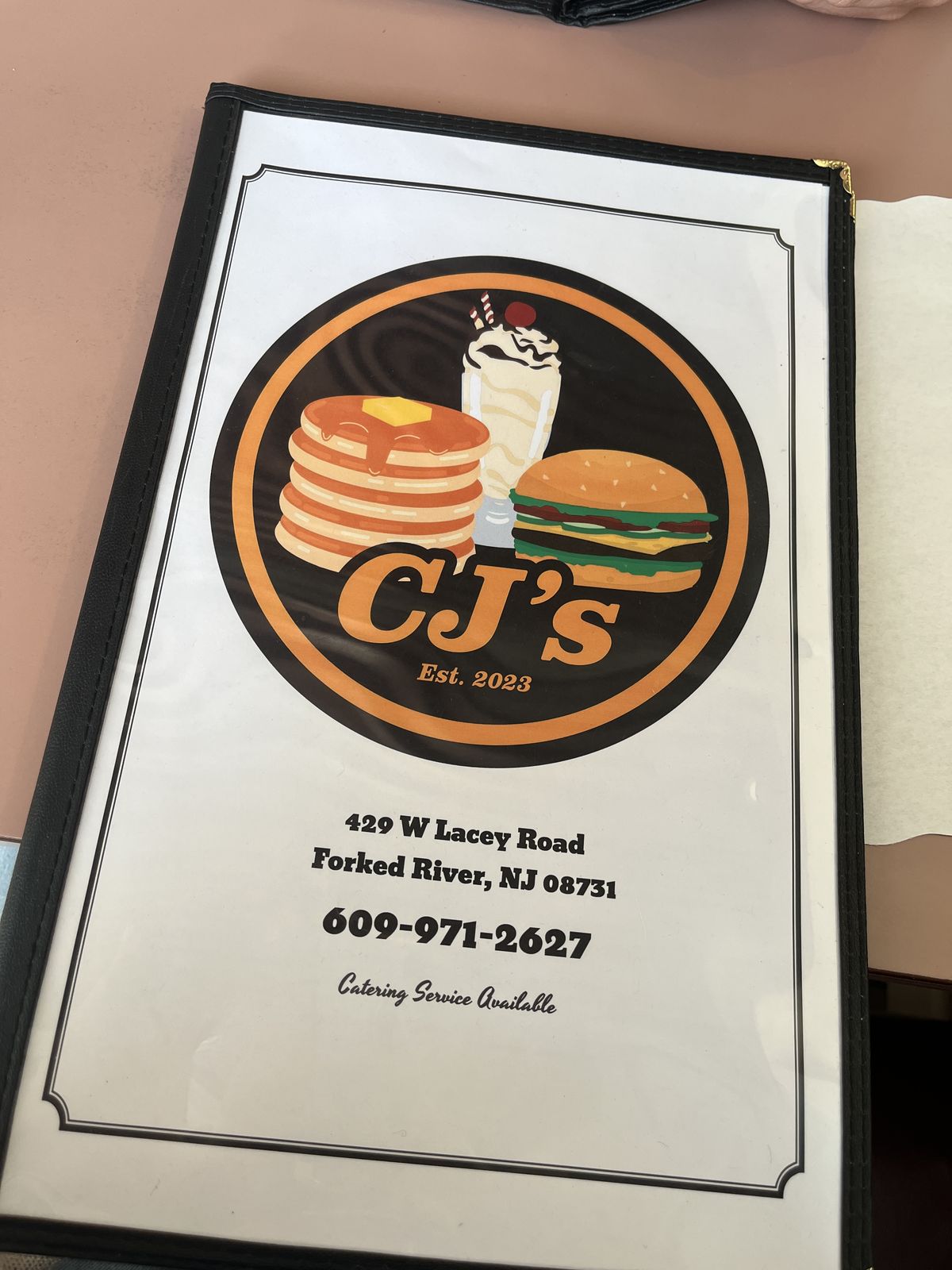 CJ's menu cover with logo